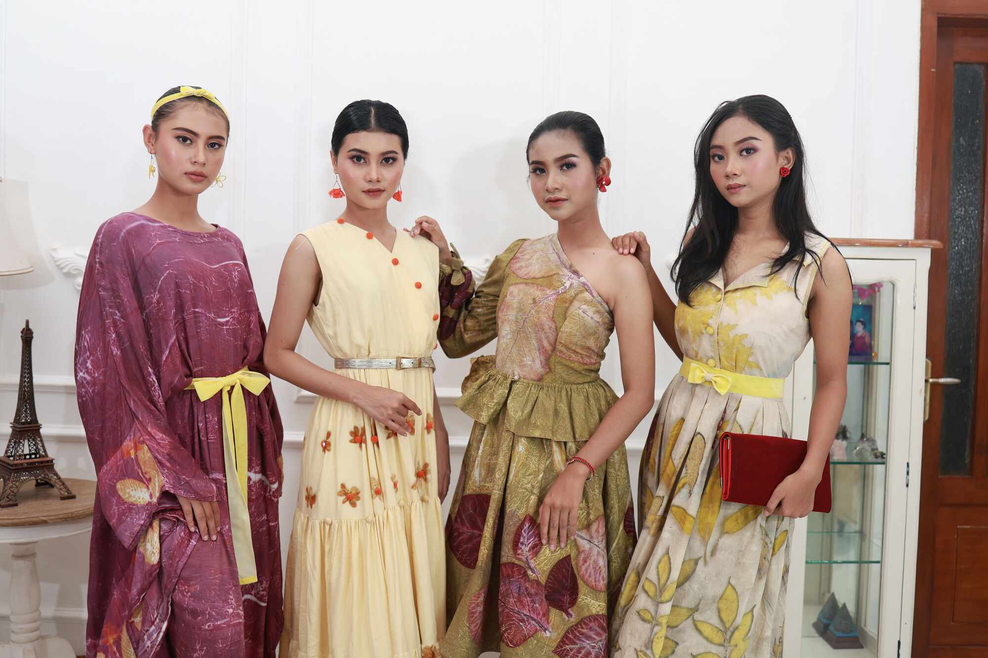 Four models in mixed eco-print looks