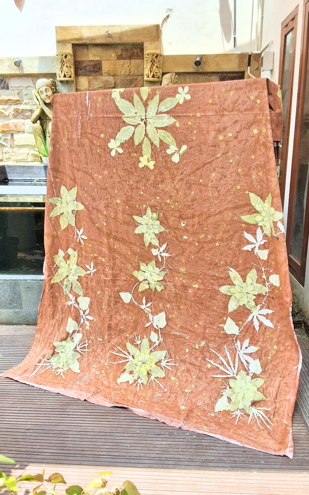 Eco-printed fabric showing leaf patterns
