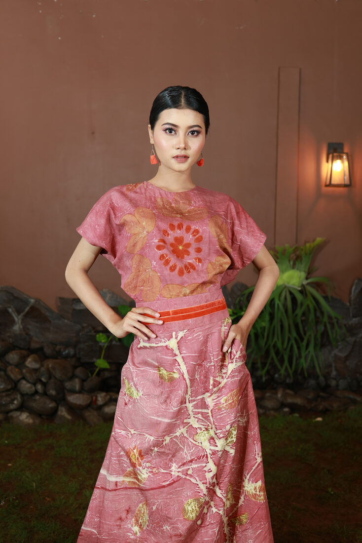 Red eco-print top and skirt with a floral medallion motif