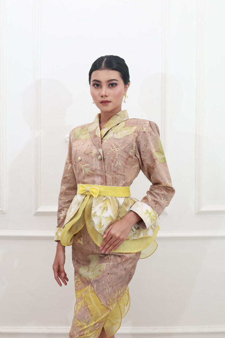 Rust eco-print jacket with cream trousers